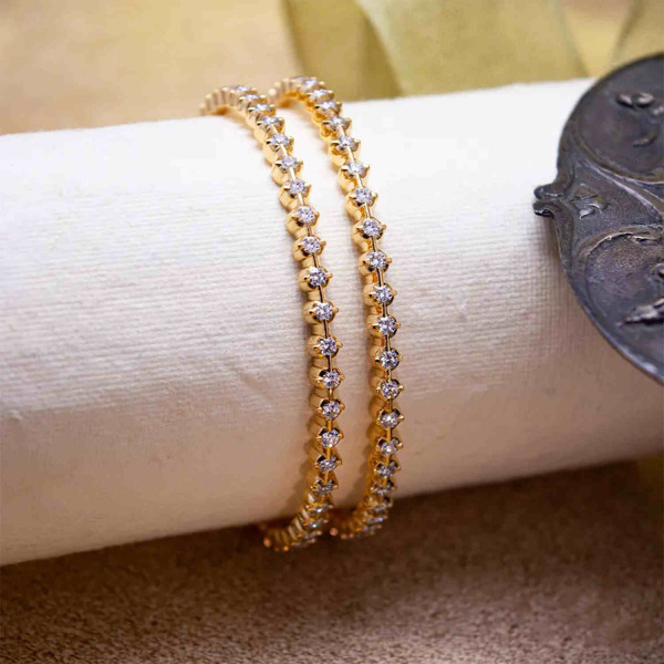 7 Cent closed setting diamond bangles handcrafted in 22kt Yellow Gold